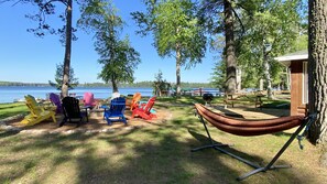 Property grounds - Lakefront cabin on Lost Lake with dock and firepit next to bar and grill! (St. Germain)