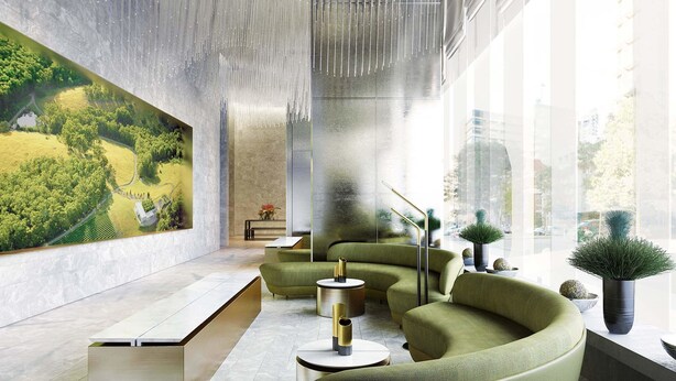 A modern interior with a curved green sofa, a round coffee table, and a large window with a cityscape view.