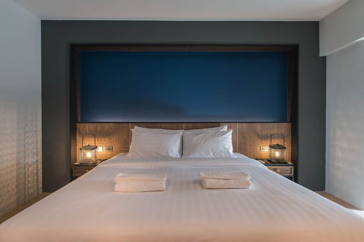 Luxe beddengoed, een bureau, verduisterende gordijnen, gratis wifi