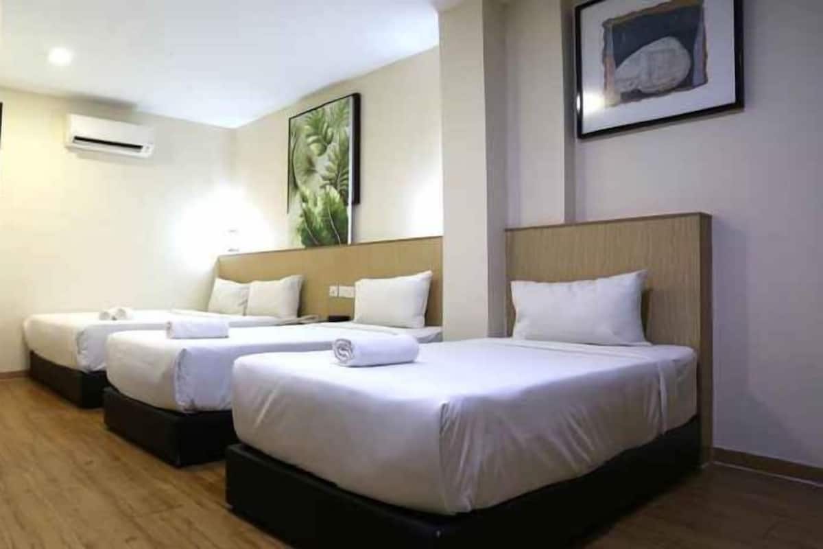 Tempur-Pedic beds, individually furnished, laptop workspace