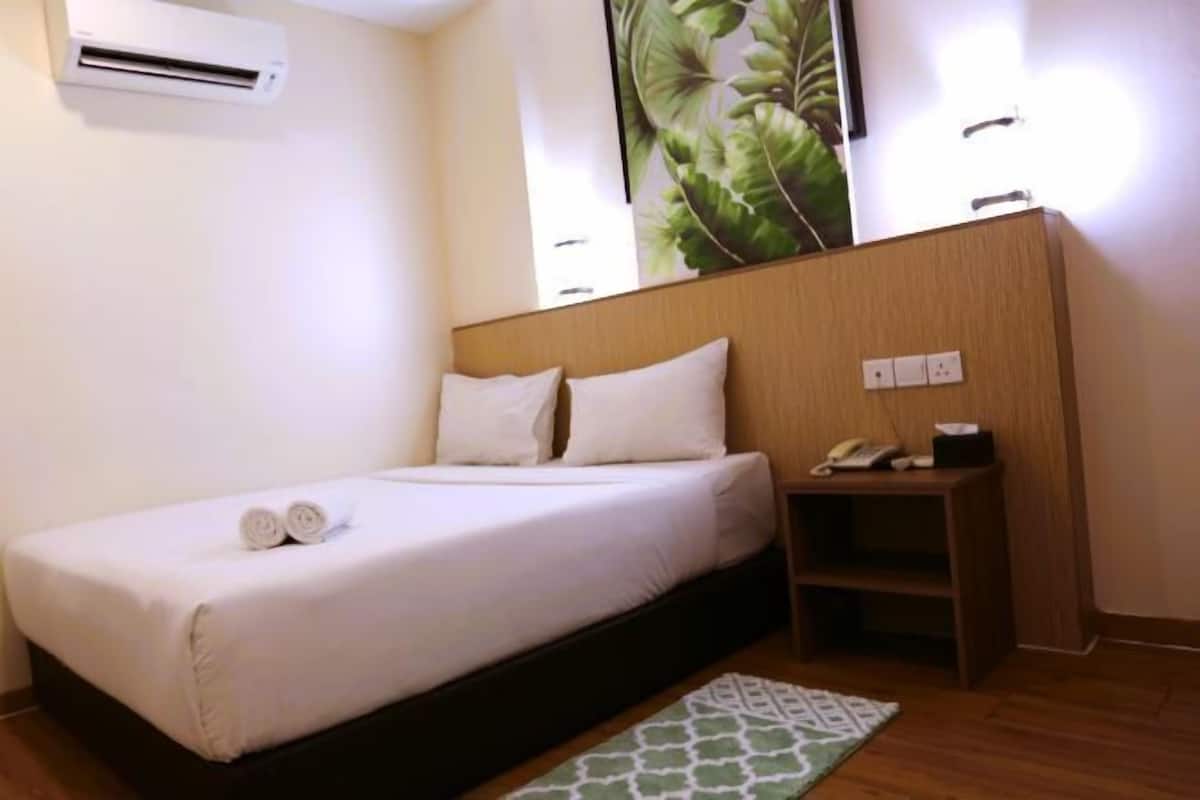 Tempur-Pedic beds, individually furnished, laptop workspace