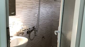 Shower, free toiletries, hair dryer, slippers