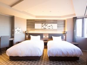 Deluxe Twin kamer (large) | Luxe beddengoed, donsdekens, een minibar, een kluis op de kamer