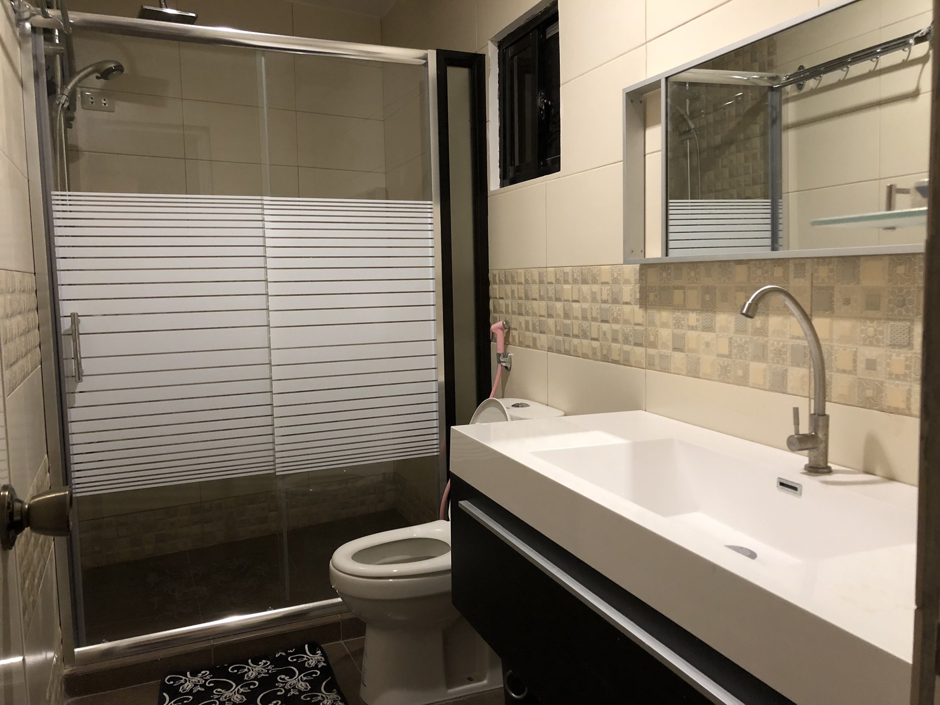 Deluxe Apartment, 1 Bedroom | Bathroom | Shower, rainfall showerhead, free toiletries, slippers