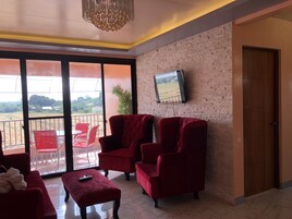Apartamento Deluxe, 1 habitación | Sala de estar