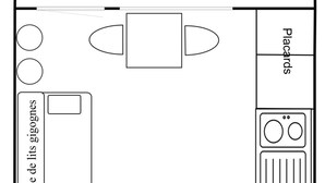 A simple kitchen layout with a TV, a dining area, and a placard section.