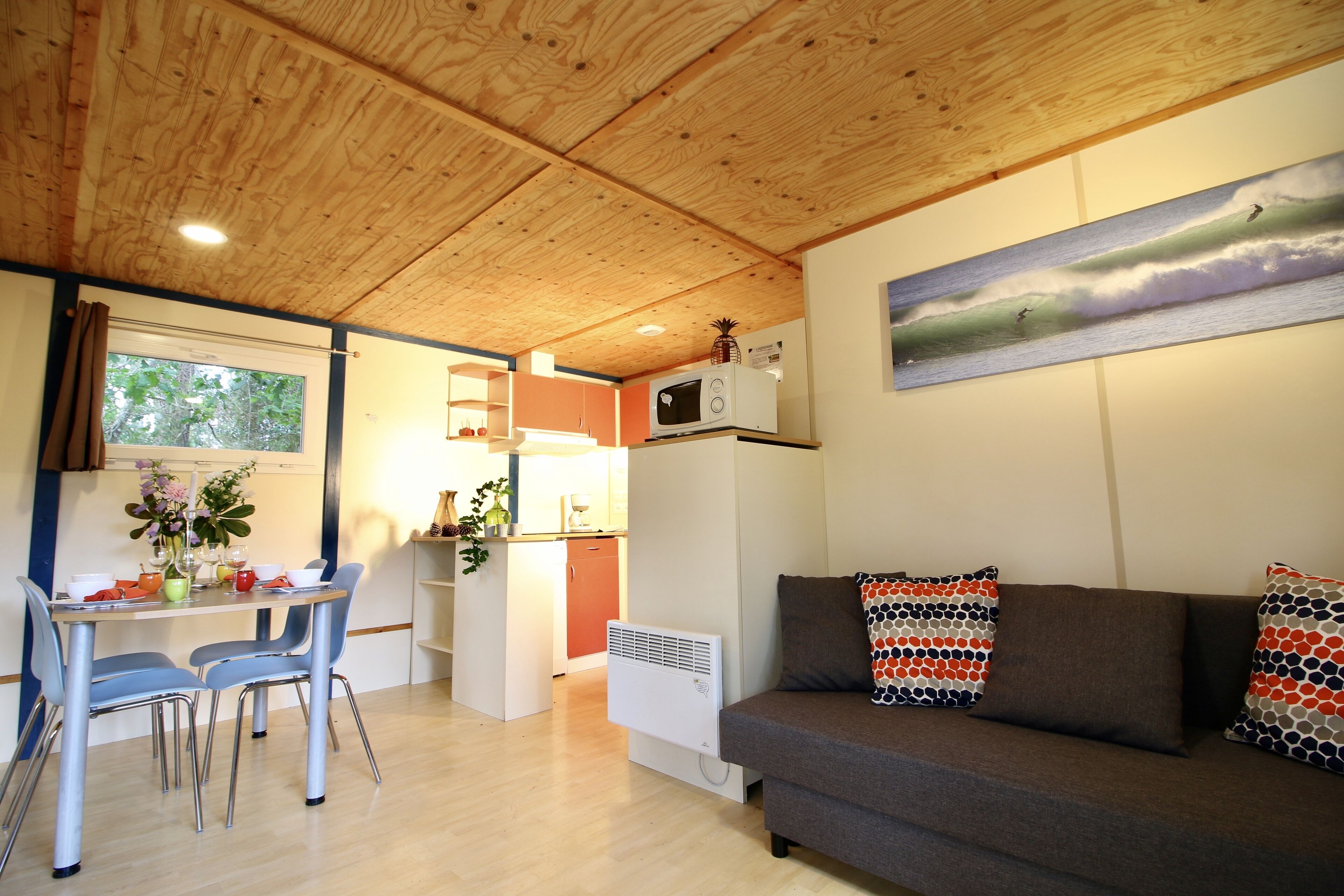 full-sized fridge, microwave, cookware/dishes/utensils