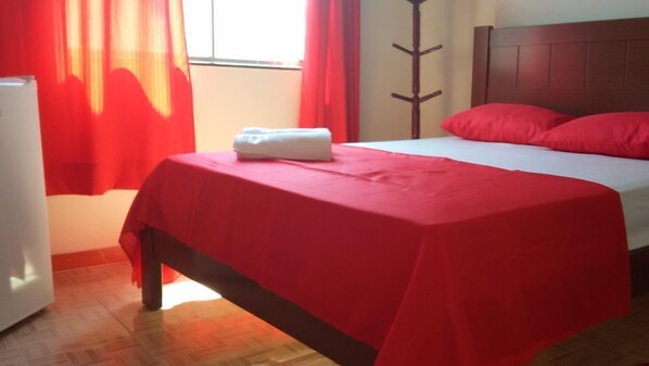 Premium bedding, desk, blackout drapes, soundproofing