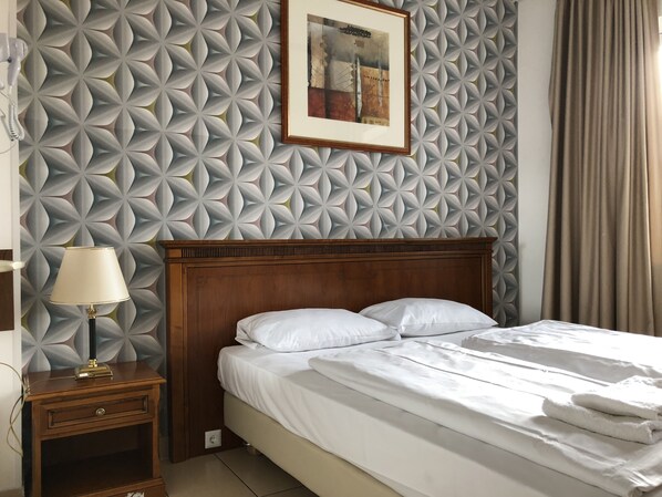 Desk, iron/ironing board, free WiFi, bed sheets