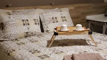 Deluxe Triple Room, 1 Bedroom, Pool View, Poolside | 1 bedroom, pillowtop beds, minibar, individually decorated