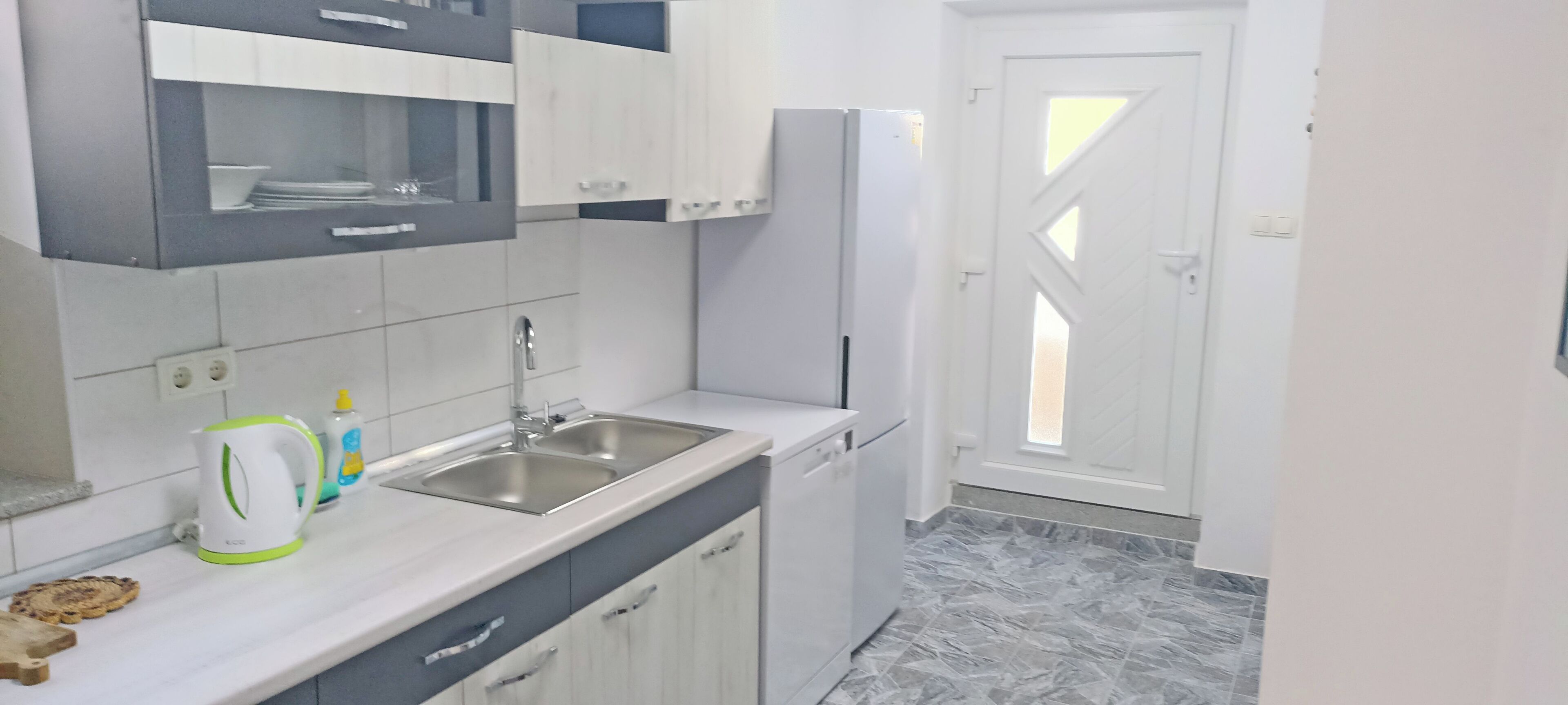 two - bedroom apartment with terrace | private kitchen | full-sized fridge, stovetop, electric kettle