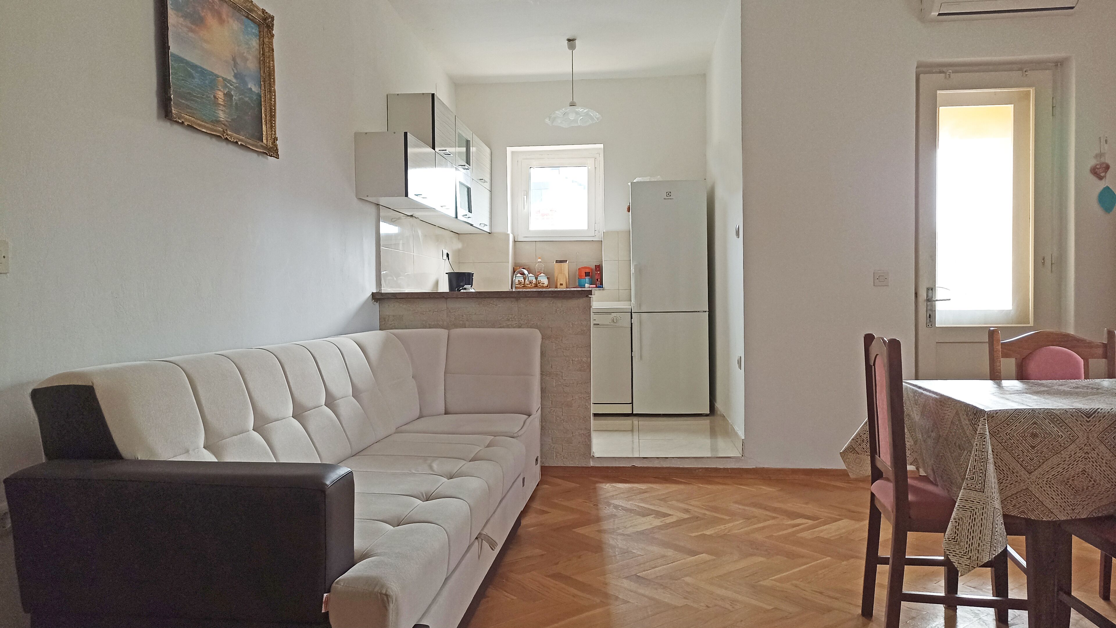 three bedroom apartment | living area | lcd tv