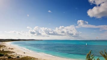 On the beach, sun-loungers, beach towels