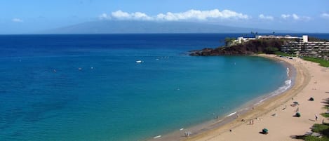 On the beach, sun-loungers, beach towels