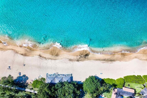 On the beach, sun-loungers, beach towels