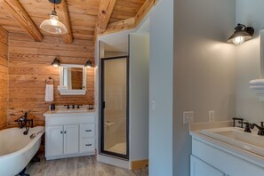 Combined shower/bathtub, hair dryer, towels, soap