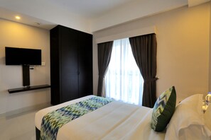 Elite studio suite, 1 queensize bed | 1 slaapkamer, luxe beddengoed, een minibar, een kluis op de kamer
