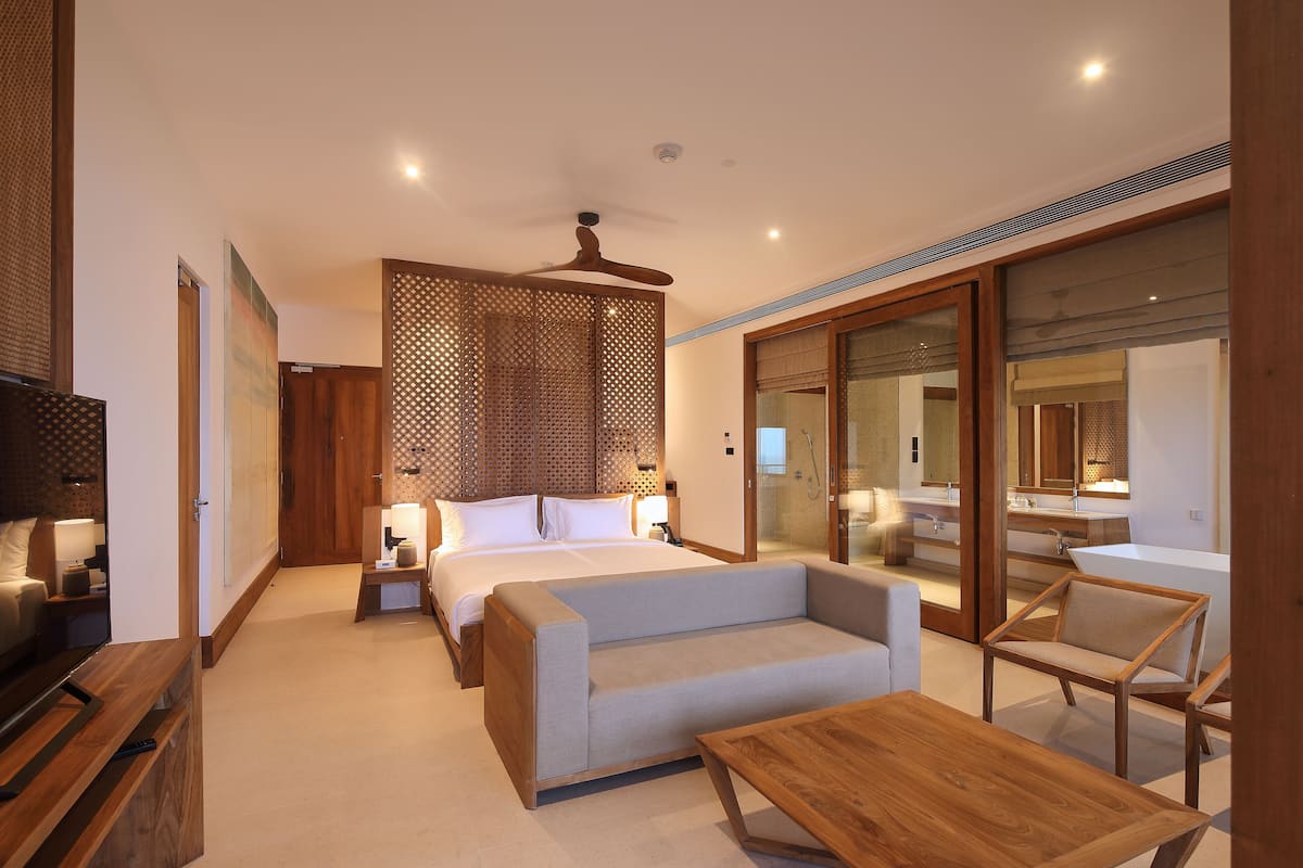 design suite, balcony, ocean view | 1 bedroom, premium bedding, minibar, in-room safe