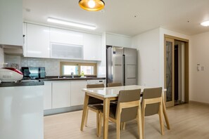 Family Triple Room | Private kitchen