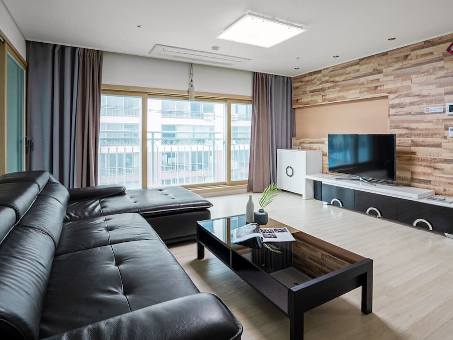 Family Triple Room | Living area | Flat-screen TV