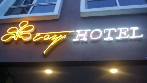 A hotel sign with the name "Bey Hotel" in illuminated neon lights. - Tey Hotel (Pasir Gudang)