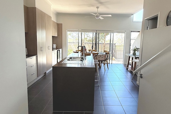Stairs leading down to kitchen, meals and entrance