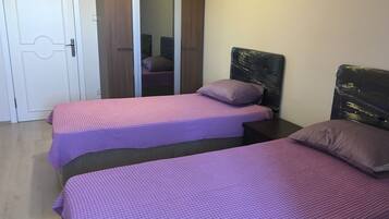 Family Duplex, 3 Bedrooms | Iron/ironing board, free WiFi, bed sheets