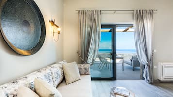 Villa, 1 habitación, alberca privada | Área de sala de estar | Televisión