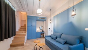 Suite – executive | Oppholdsrom | En 32-tommers smart-TV med Parabol-TV samt TV