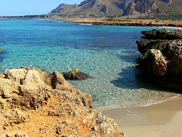 On the beach, sun loungers, beach towels