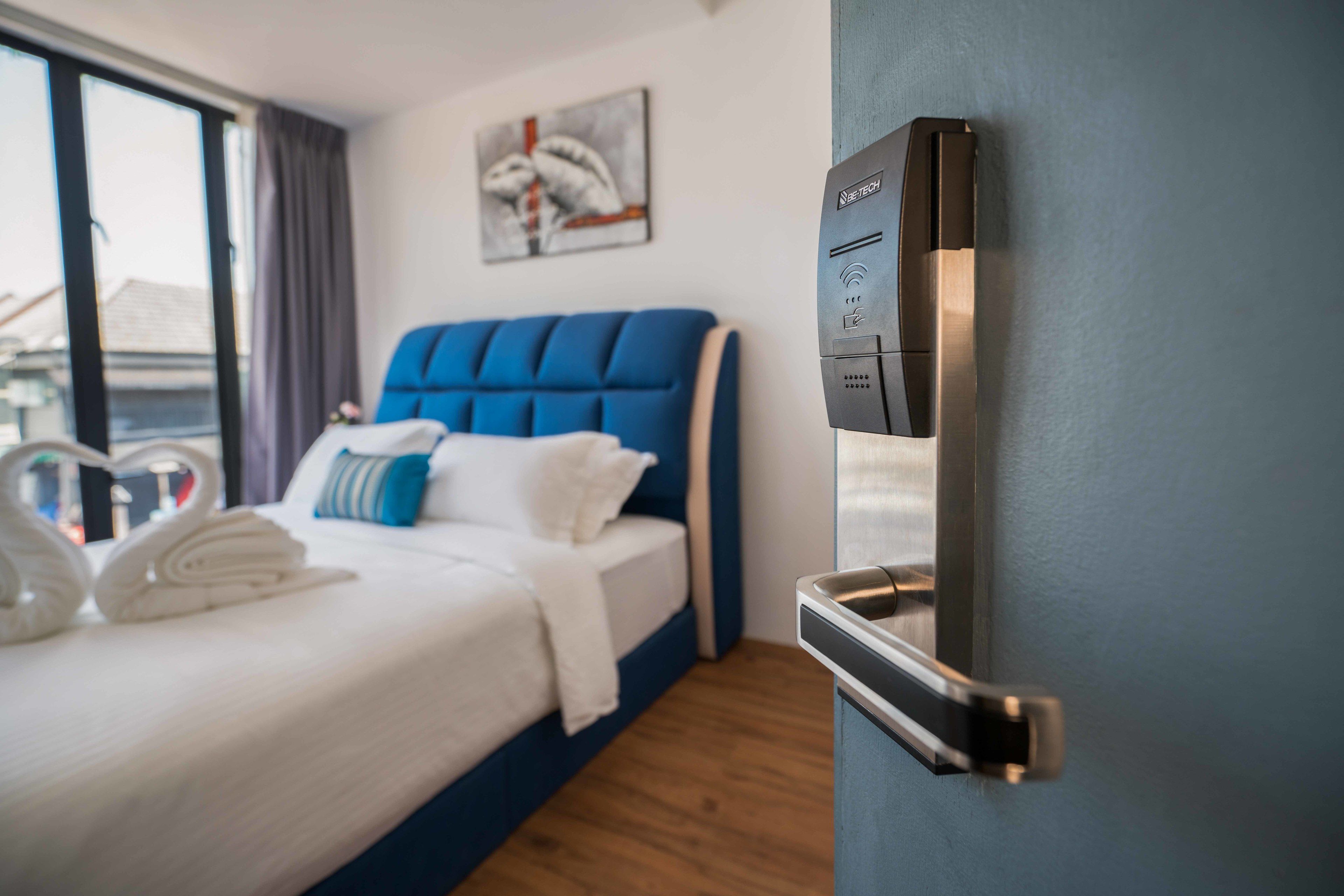 family suite, 2 queen beds, city view | in-room safe, desk, iron/ironing board, free wifi