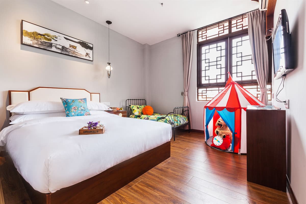 Family Room | Premium bedding, in-room safe, individually decorated