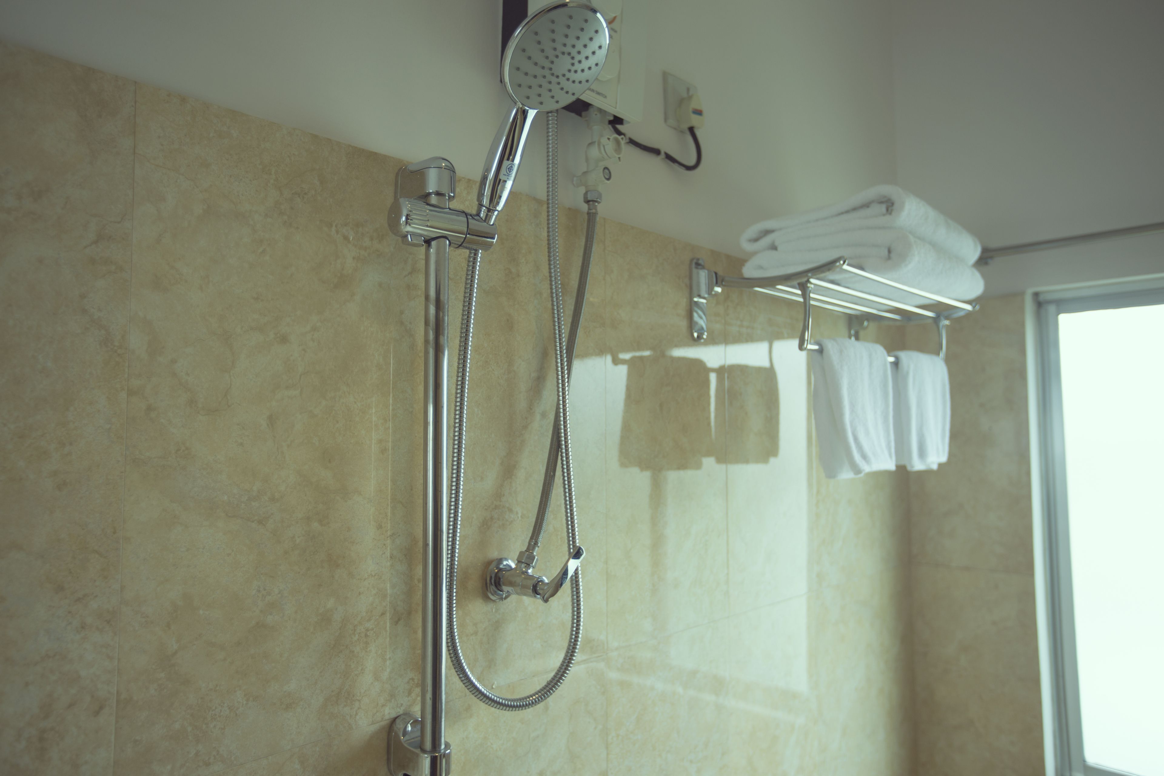 Superior Room | Bathroom | Shower, hair dryer, towels