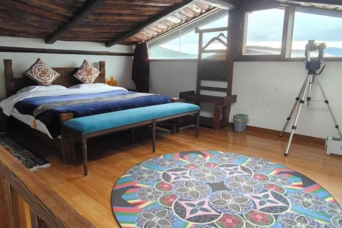 Premium bedding, Select Comfort beds, laptop workspace, blackout drapes
