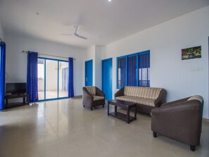 Double or Twin Room | Living room | TV - OYO 11899 Home Greek Style 4BHK Penthouse Bambolim (Panaji)