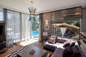 Deluxe Villa, 3 Bedrooms, Private Pool | Living area | Flat-screen TV, DVD player