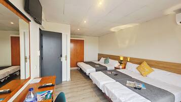 Family Quadruple Room, Multiple Beds | In-room safe, desk, soundproofing, free wired internet