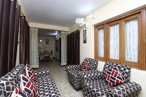 Double or Twin Room | Living room | Flat-screen TV - OYO 12437 Home Valley View 2BHK Villa Gun Hill (Dehradun)