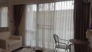 Studio | Living area | Flat-screen TV - City Center Residence by Pattaya Holiday (Pattaya)