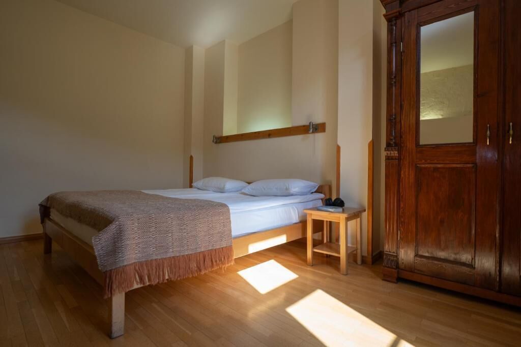 Grand Triple Room, 1 Bedroom, Mountain View | Individually decorated, individually furnished, desk, iron/ironing board