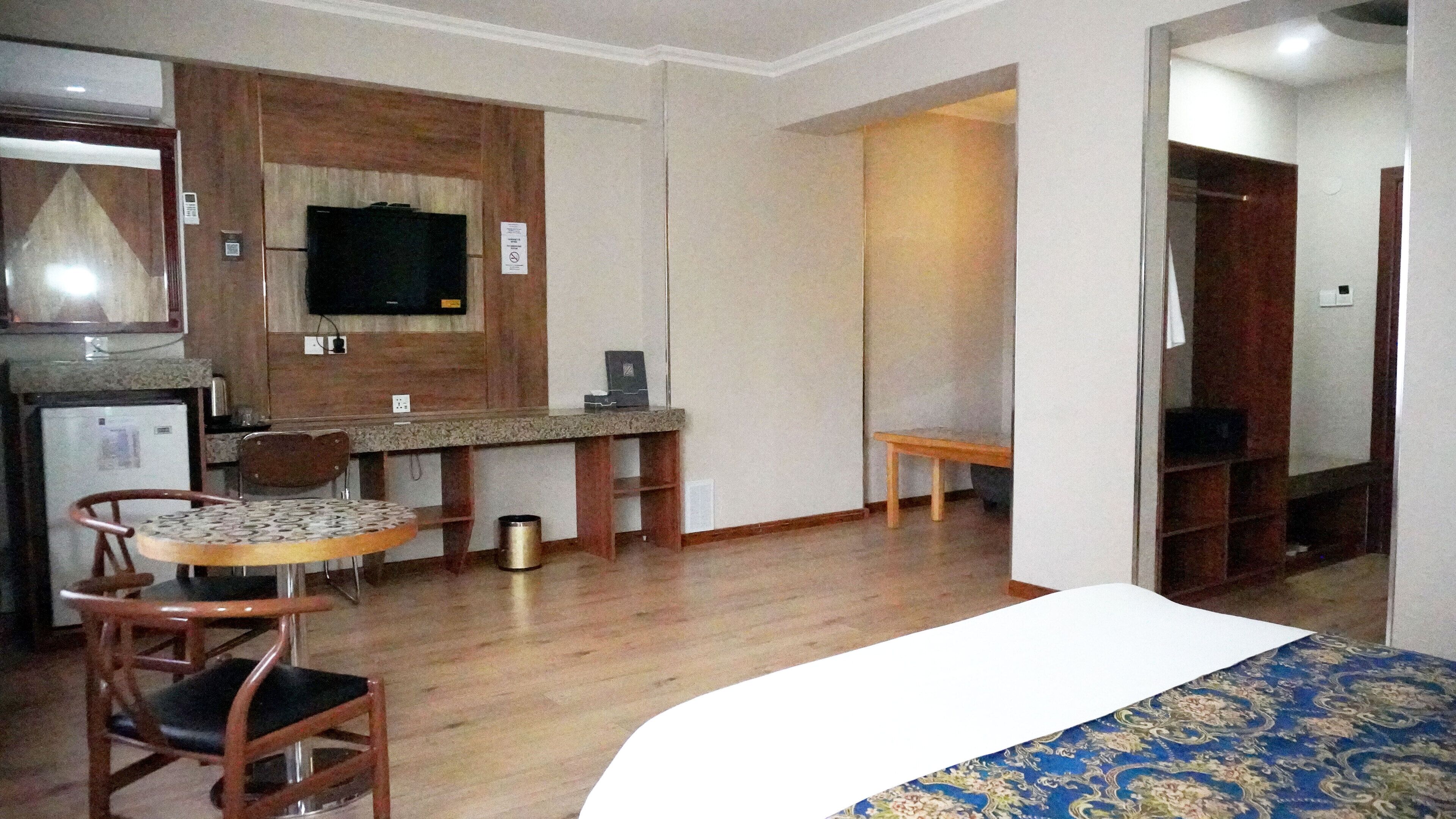 Superior Double Room | Living area | Flat-screen TV