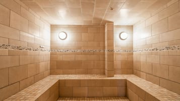 Experience the serene ambiance of this stylish space, featuring a patterned tile border and clean design.
