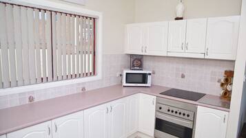 Villa (2 Bedrooms) | Private kitchen | Fridge, microwave, oven, stovetop