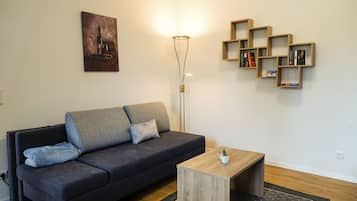 Ferienwohnung Max & Moritz | Woonruimte | Een flatscreentelevisie