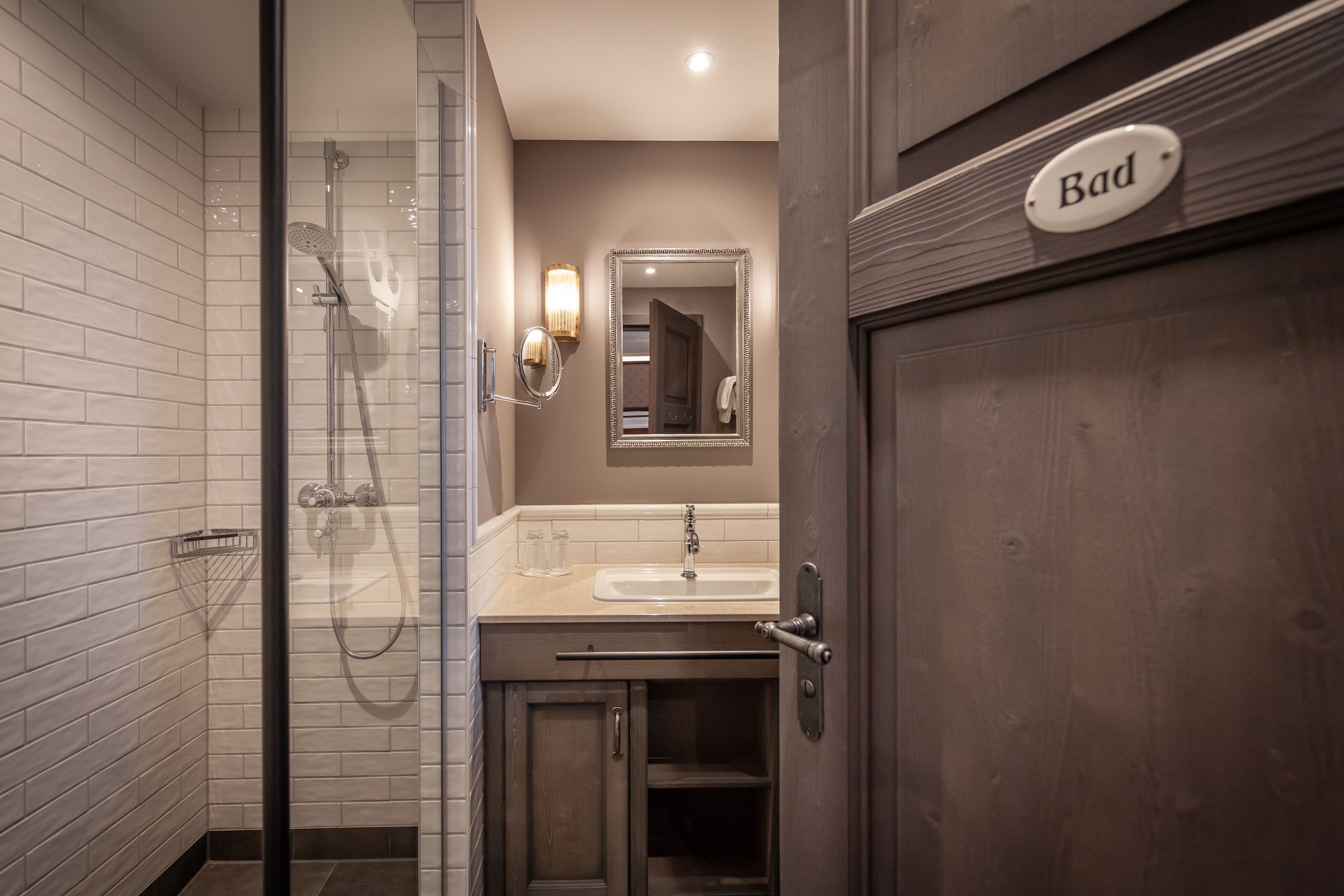 shower, hair dryer, bathrobes, towels