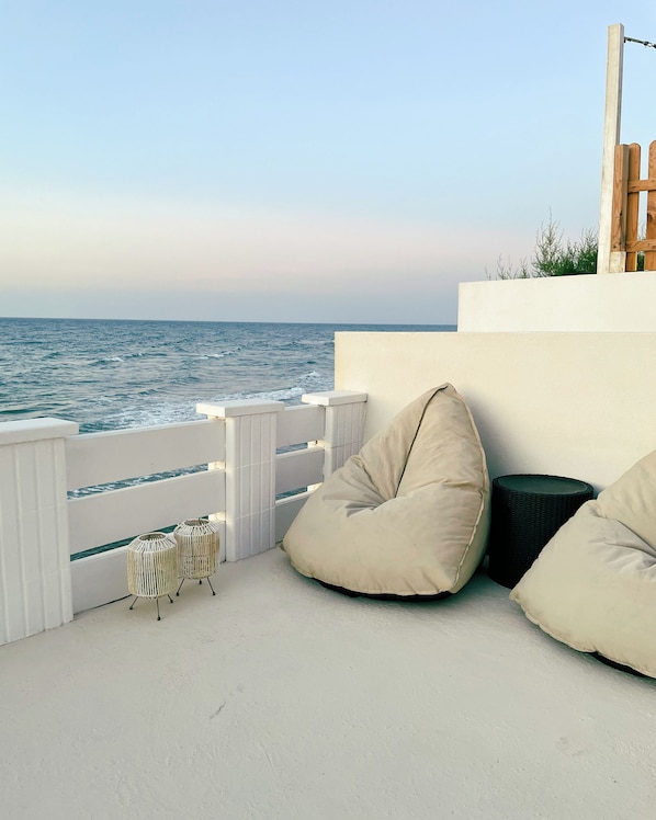 Luxury Villa, Beach View, Beachfront | Terrace/patio