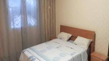 Comfort Apartment, 1 Bedroom, City View | 1 bedroom, desk, iron/ironing board, free WiFi