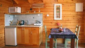 Family Cabin | Private kitchenette | Fridge, microwave, stovetop, coffee/tea maker