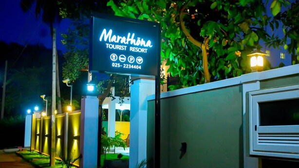 A Marahona Tourist Resort sign with a contact number. - Marathona Tourist Resort - Anuradhapura (Anuradhapura)