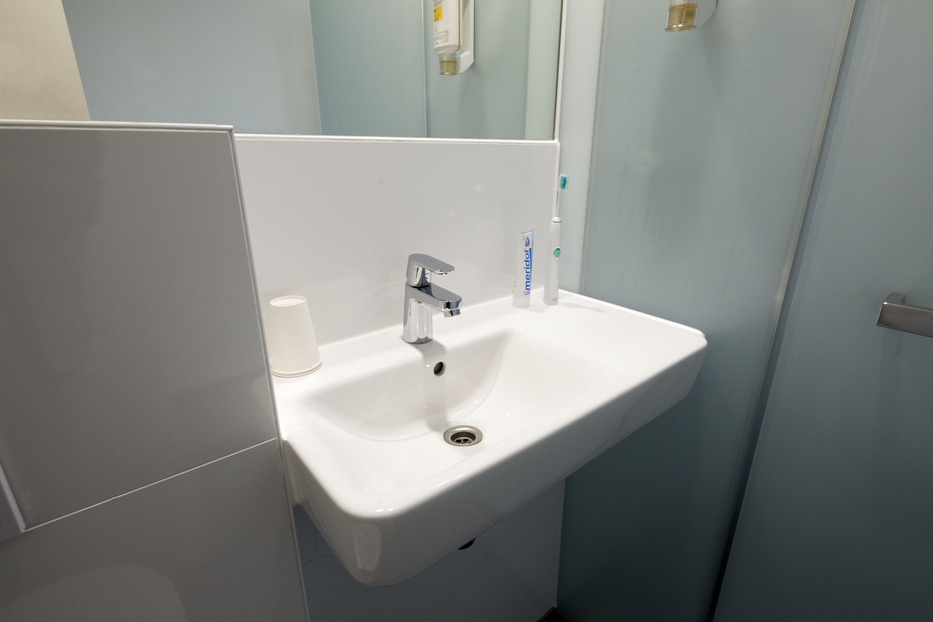 shower, eco-friendly toiletries, hair dryer, towels